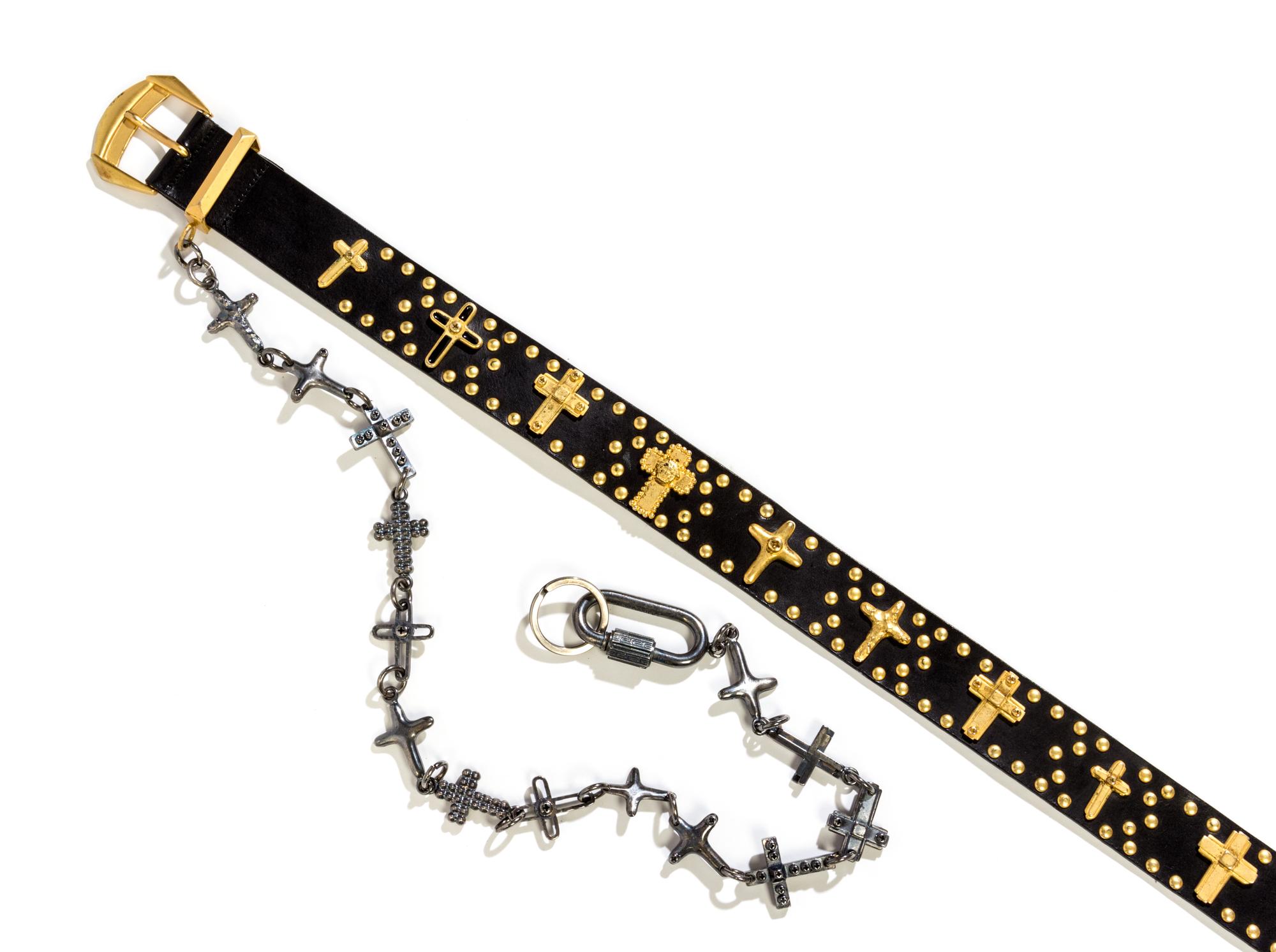 A Gianni Versace Limited Edition Black Leather Cross Belt, Belt width: 1.5"; Pin length: 6".