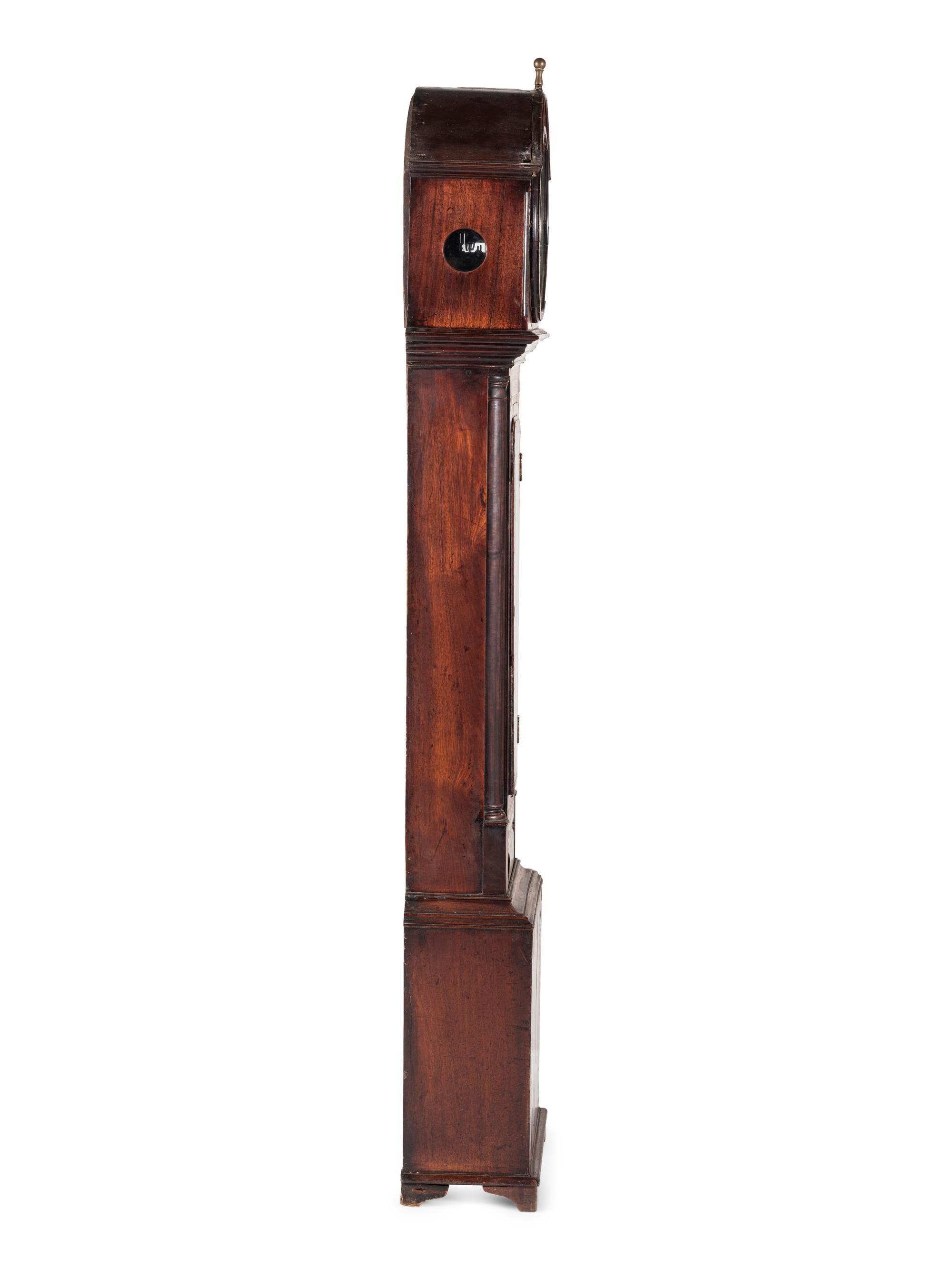 A Chippendale Inlaid and Figured Mahogany Tall Case Clock