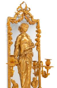 A Pair of Large Louis XVI Style Mirrored Gilt Bronze Figural Sconces