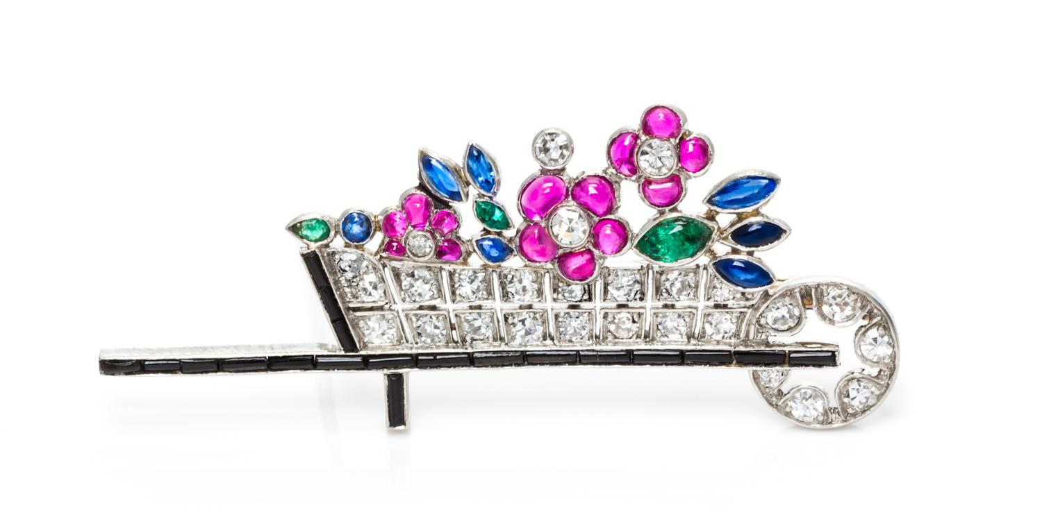 An Art Deco Platinum, Diamond, and Multigem Wheelbarrow Brooch, Austrian, 3.00 dwts.