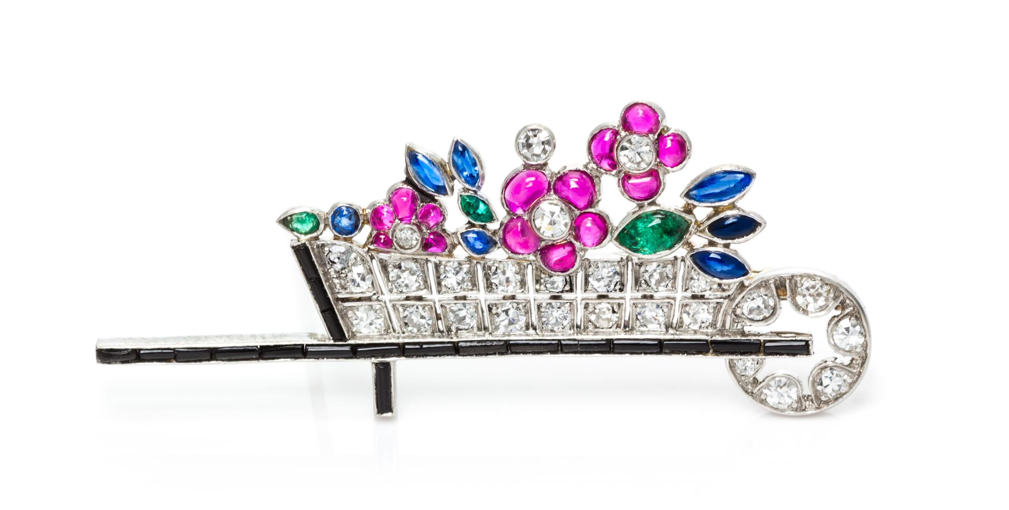 An Art Deco Platinum, Diamond, and Multigem Wheelbarrow Brooch, Austrian, 3.00 dwts.