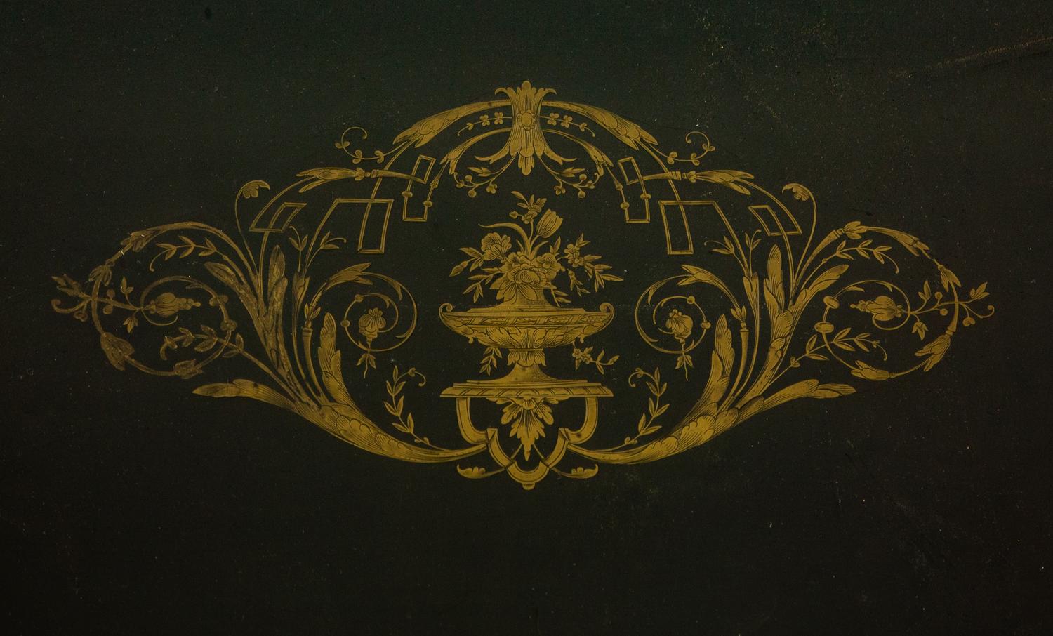 A Napoleon III Style Gilt-Bronze Mounted Ebonized Center Table