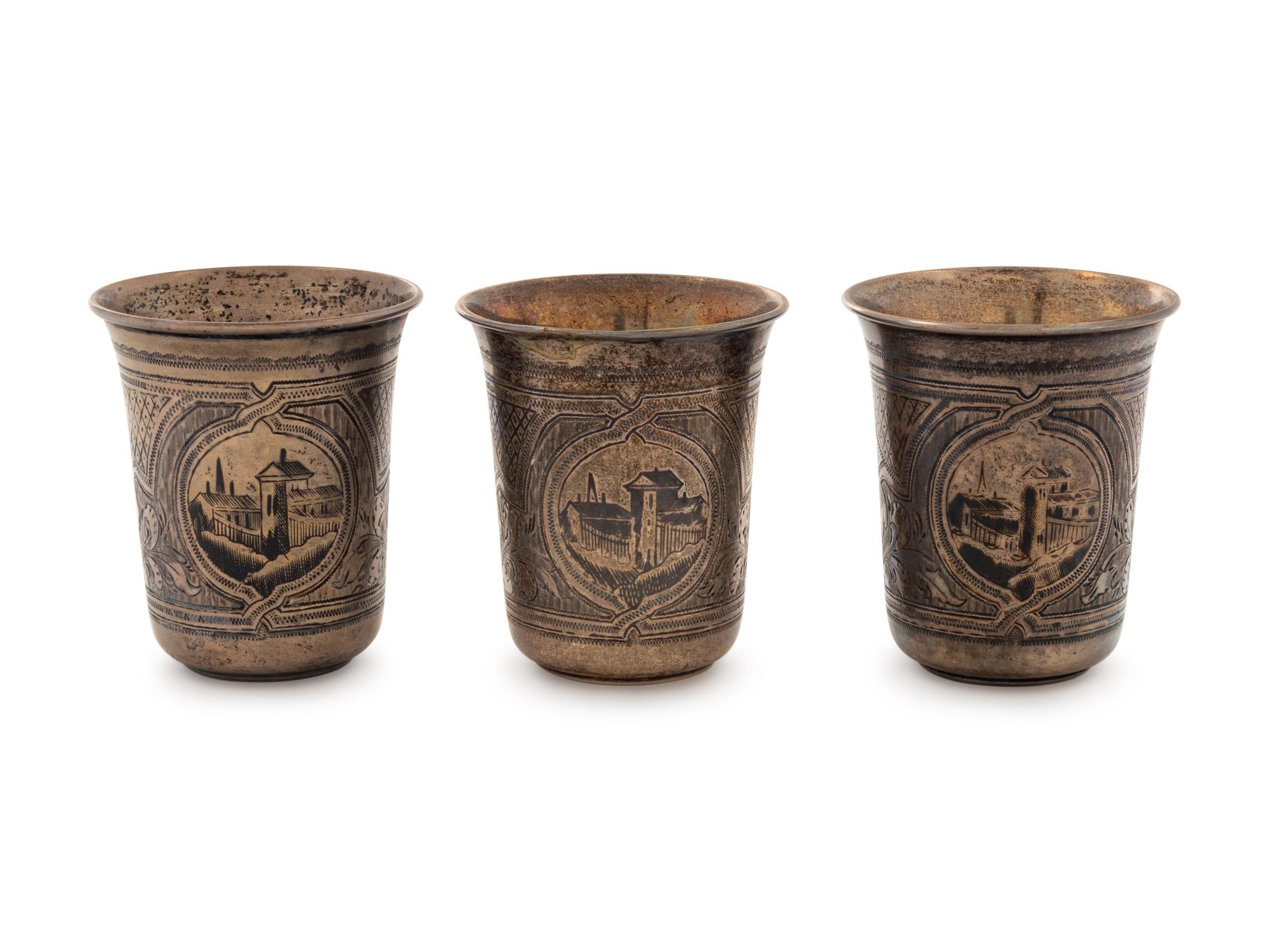 A Set of Three Russian Niello Silver Tumblers