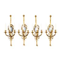 A Set of Four Gilt Bronze and Jasperware Mounted Three-Light Sconces
