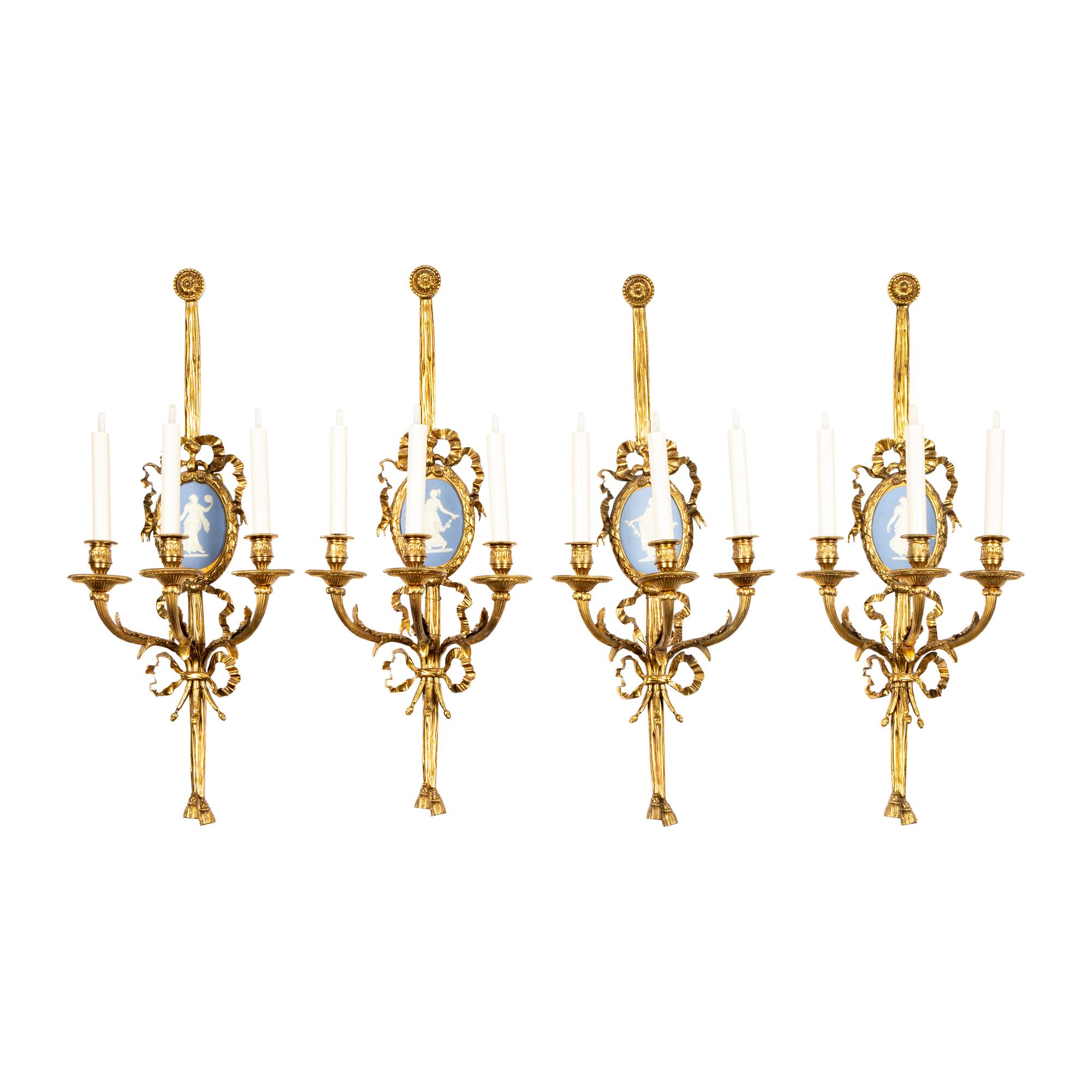 A Set of Four Gilt Bronze and Jasperware Mounted Three-Light Sconces