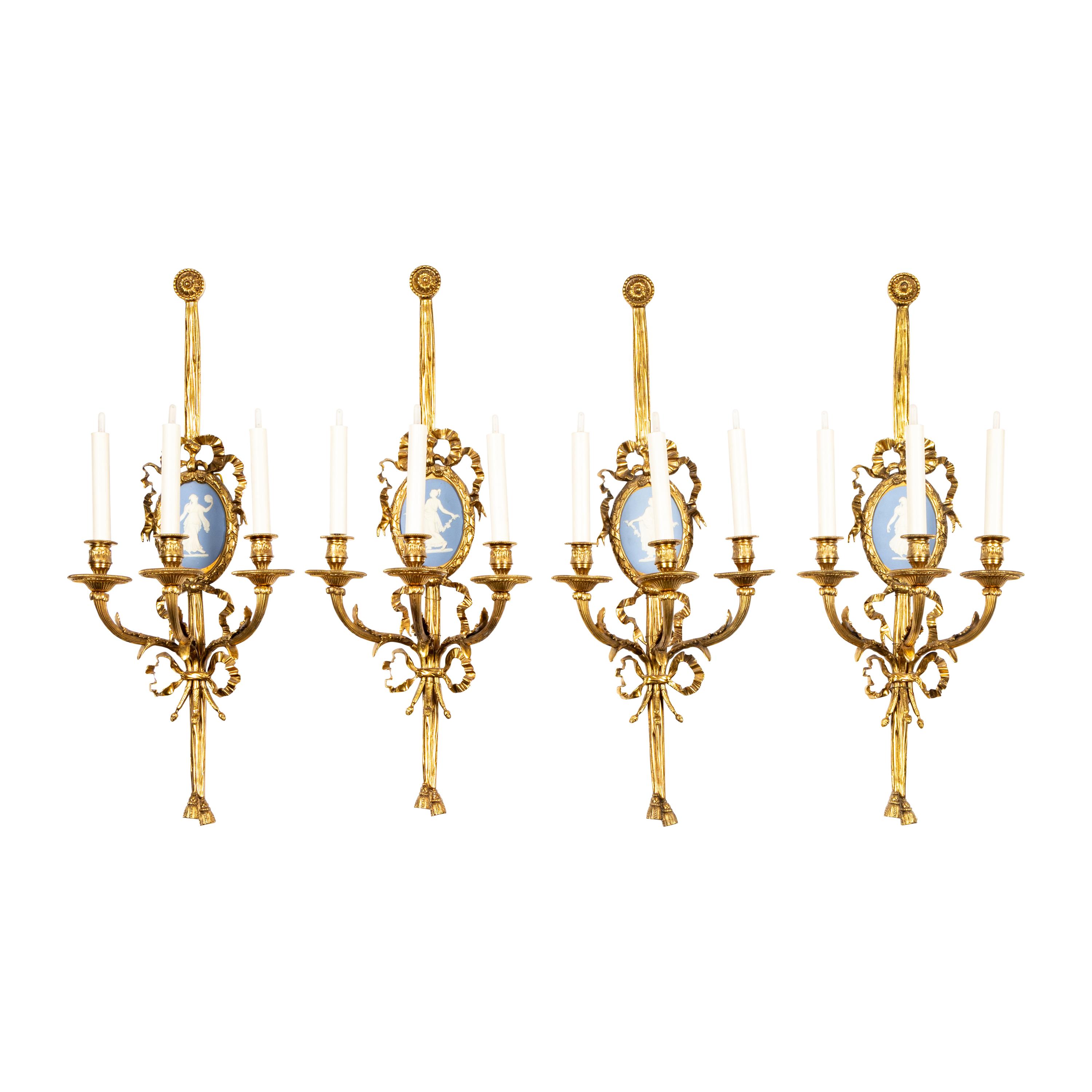 A Set of Four Gilt Bronze and Jasperware Mounted Three-Light Sconces