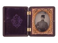 [CIVIL WAR]. A collection of items identified to brothers Robert and Samuel Burnside, Company H, 110th New York Infantry, comprised of a kepi and war-date photographs.