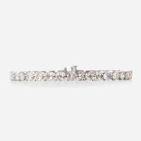 A diamond and eighteen karat white gold bracelet