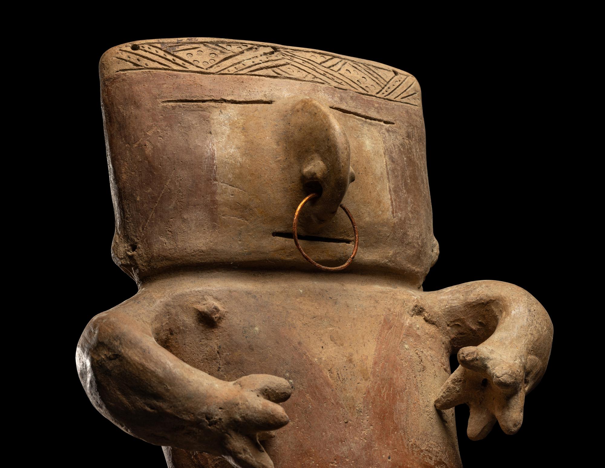 A Quimbaya Terracotta Seated Figure