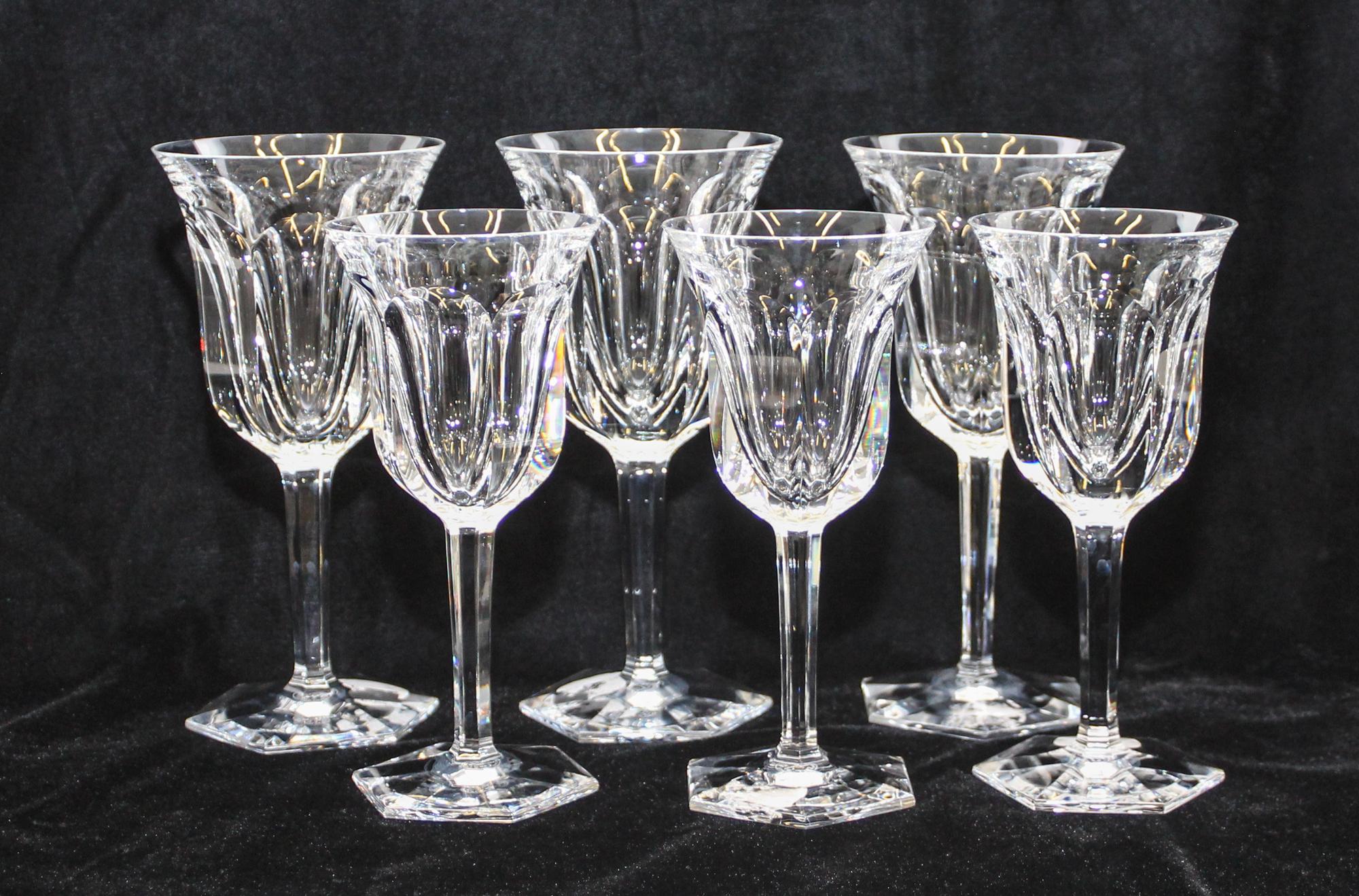 A Set of Baccarat Glasses Height of taller 8 1/8 inches.