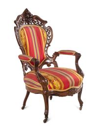 A Renaissance Revival Laminated and Carved Rosewood Three-Piece Parlor Suite