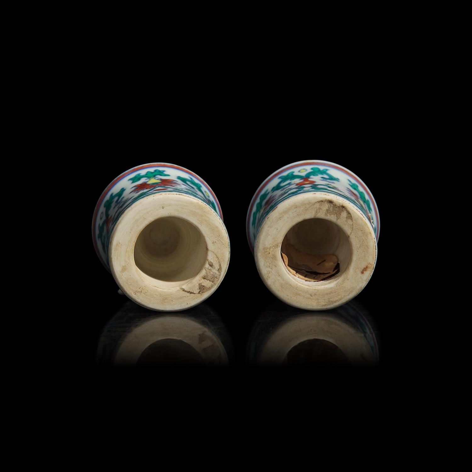 A Pair of Chinese Doucai Porcelain Scroll Caps 斗彩纏枝蓮紋軸頭