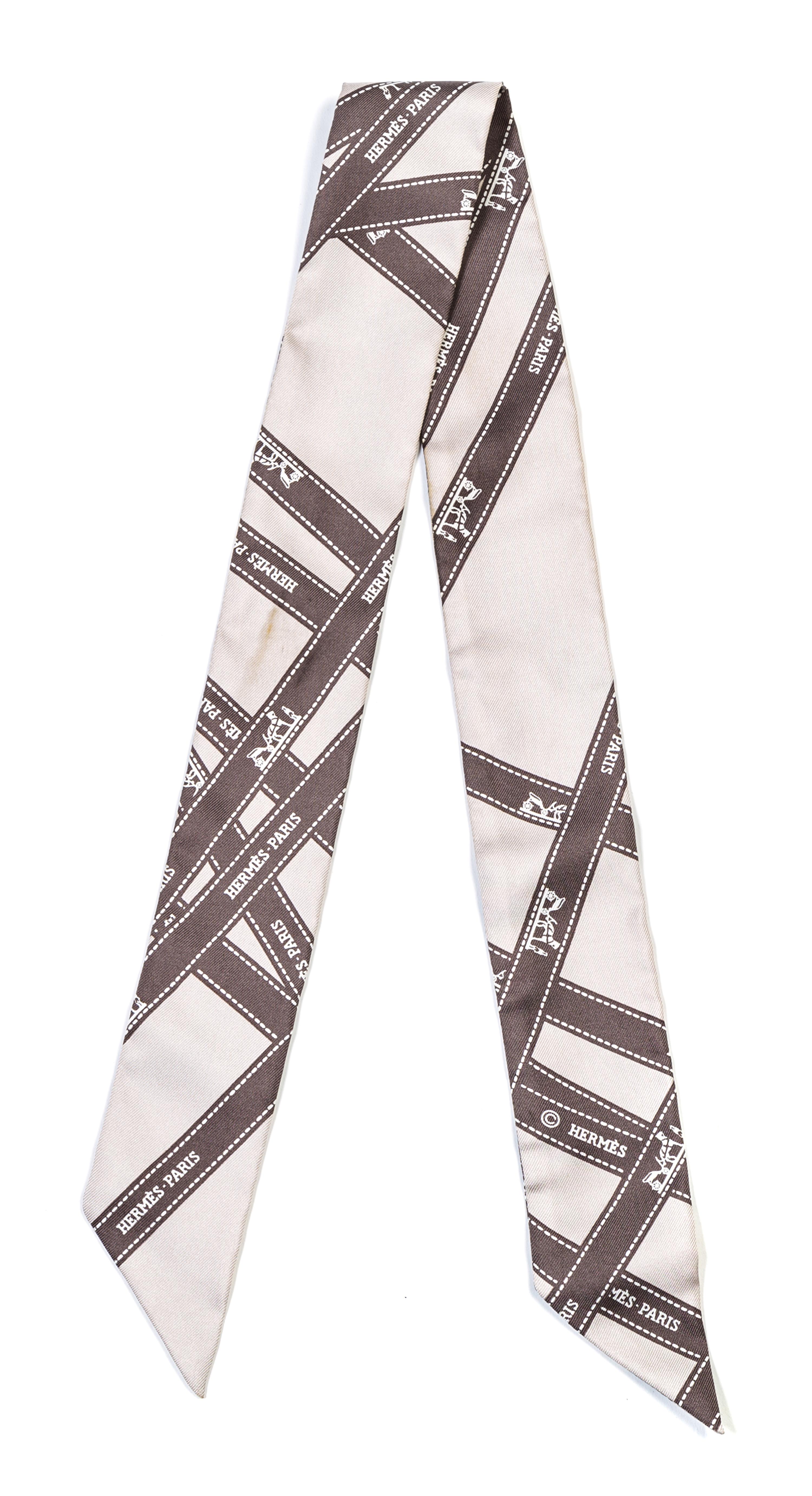An Hermes Gray Silk Twilly Scarf, 36" x 36".