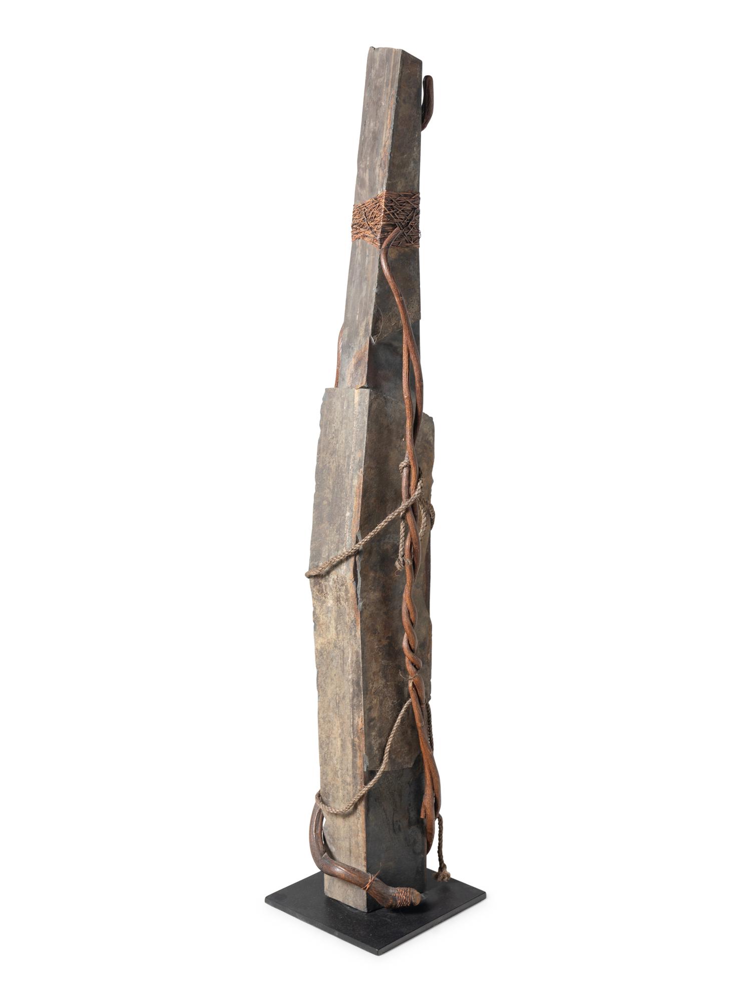 A Contemporary Stone and Rattan Sculpture