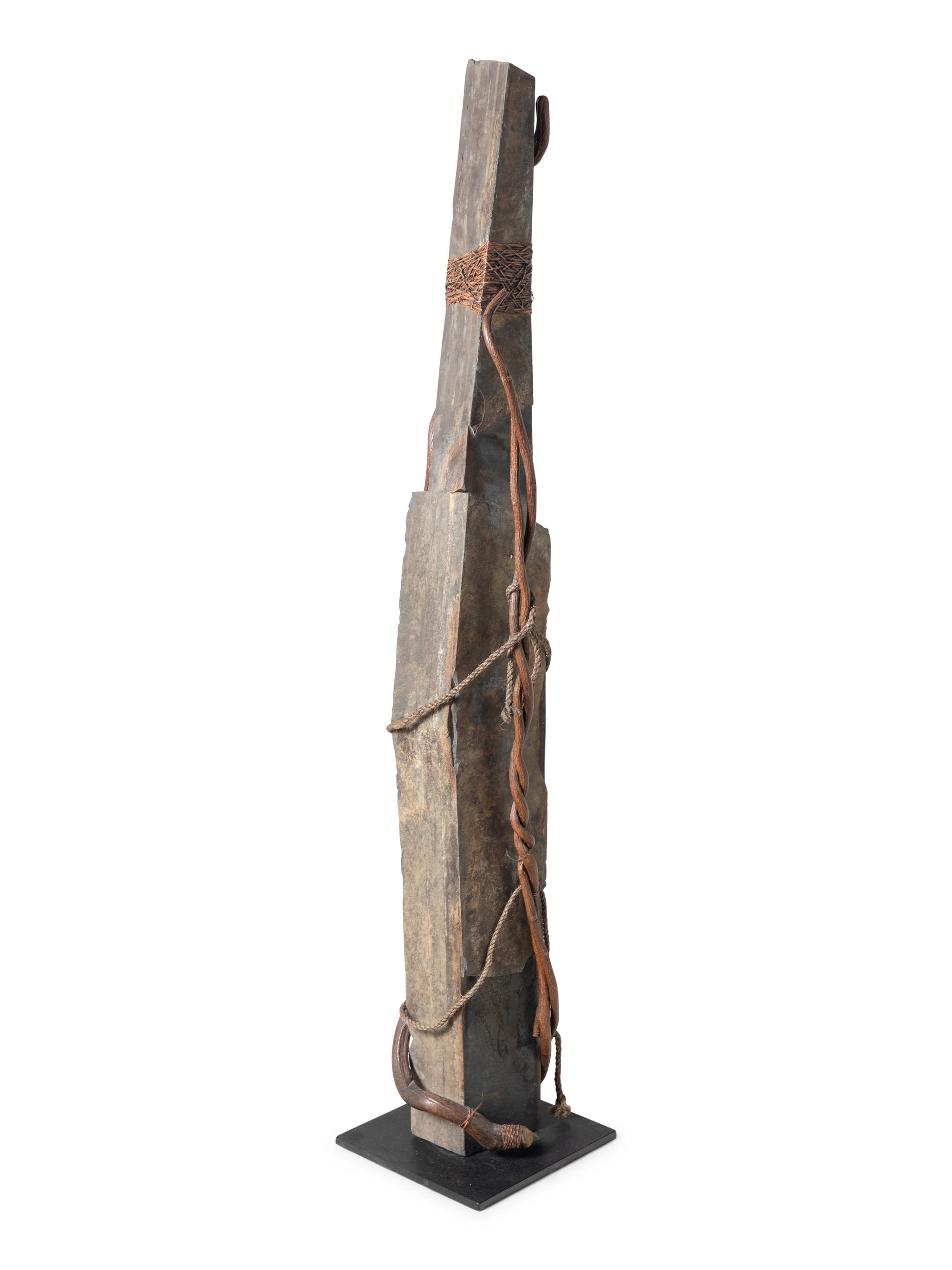 A Contemporary Stone and Rattan Sculpture