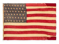 [SPANISH AMERICAN WAR]. 45-star Spanish American War-era flag identified to George W. Potter, Company K, 2nd Massachusetts Infantry, with related stereoviews, bookends, and other imprints.