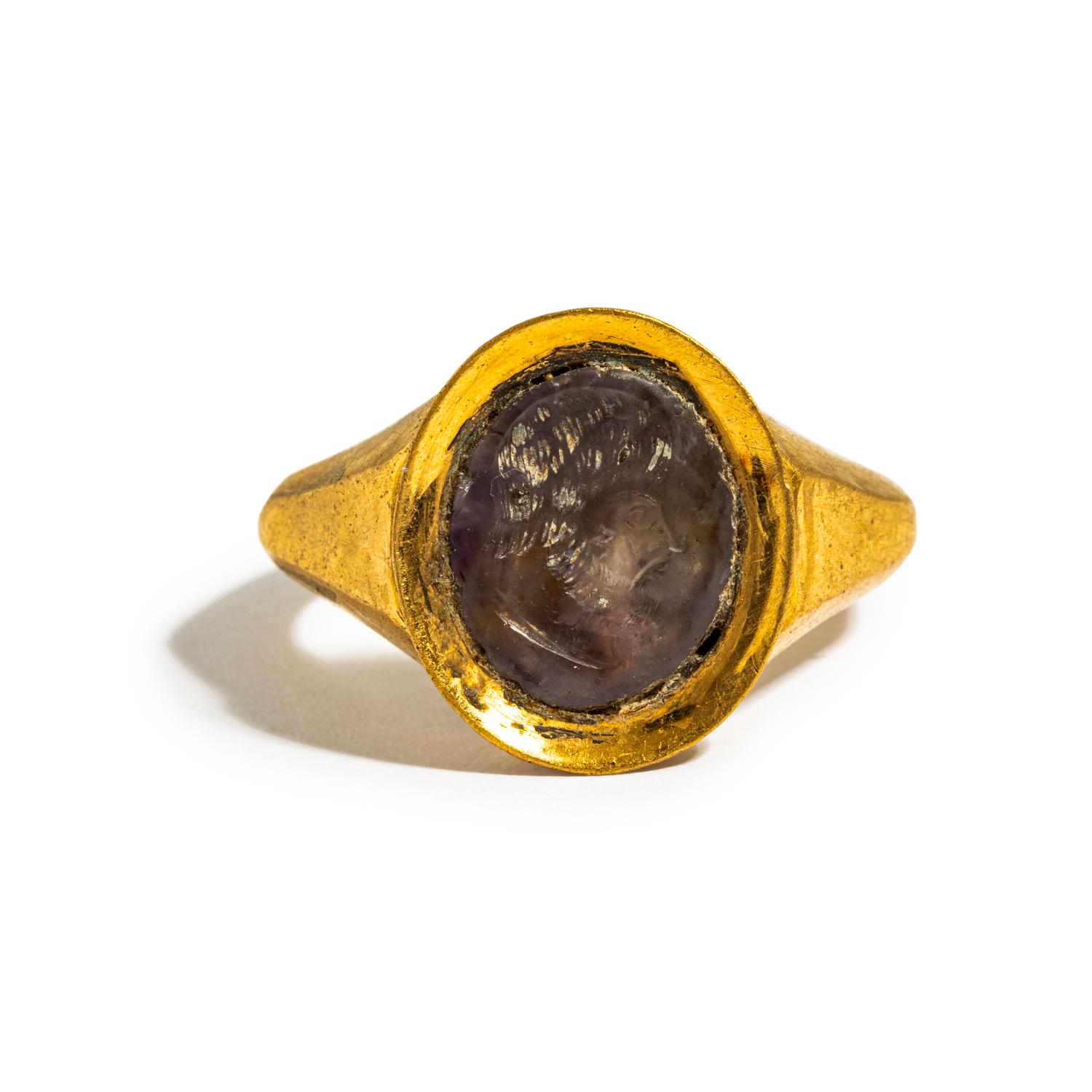 A Roman Amethyst Ring Stone with a Male Portrait Head — Set in a gold ring