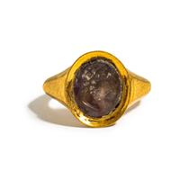 A Roman Amethyst Ring Stone with a Male Portrait Head — Set in a gold ring