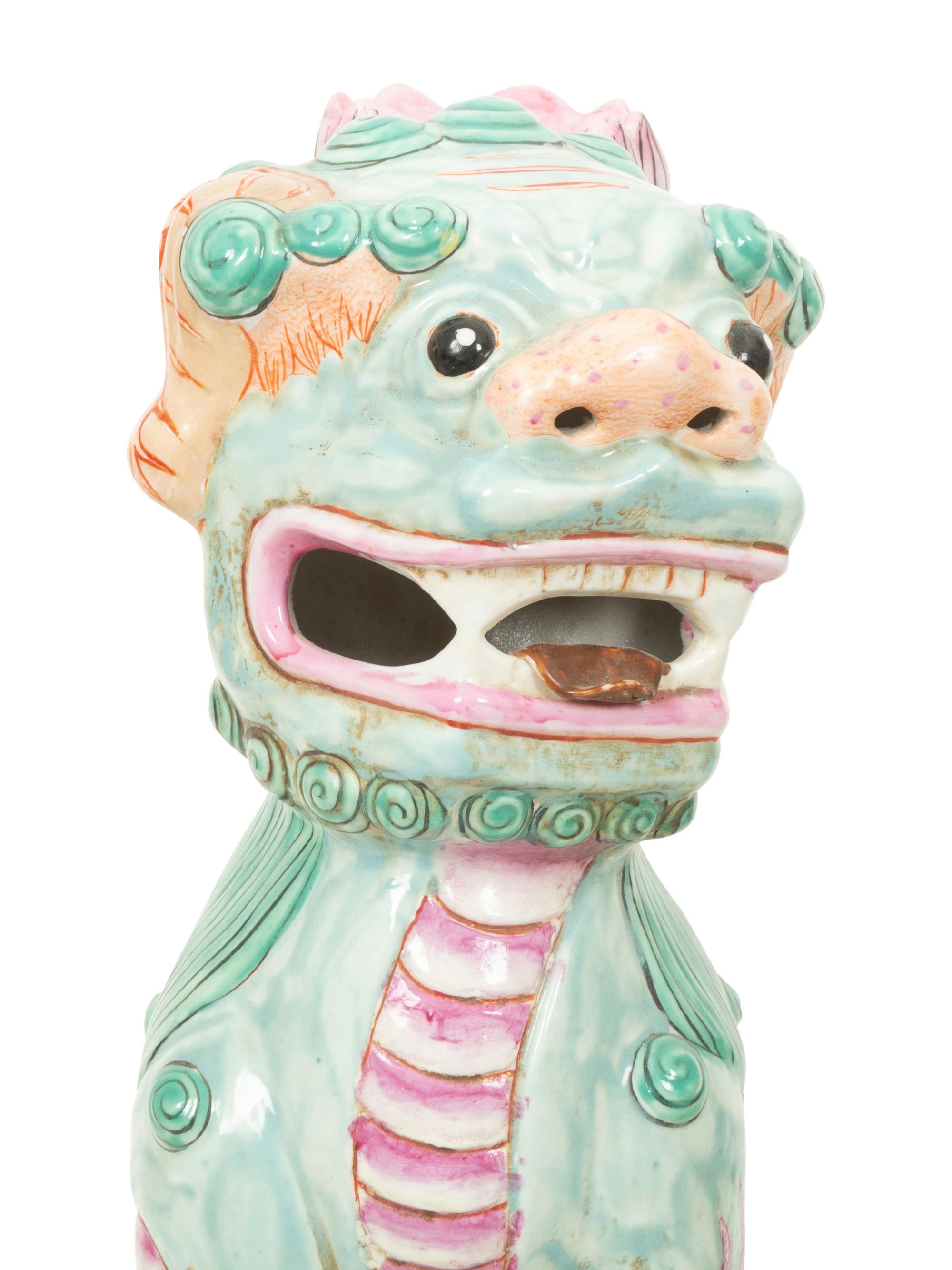 A Pair of Chinese Glazed Ceramic Seated Foo Lions