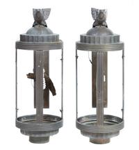 A Set of Four Art Deco Cast Metal Lanterns Height 30 inches.