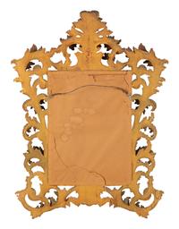 An Italian Rococo Style Giltwood Mirror