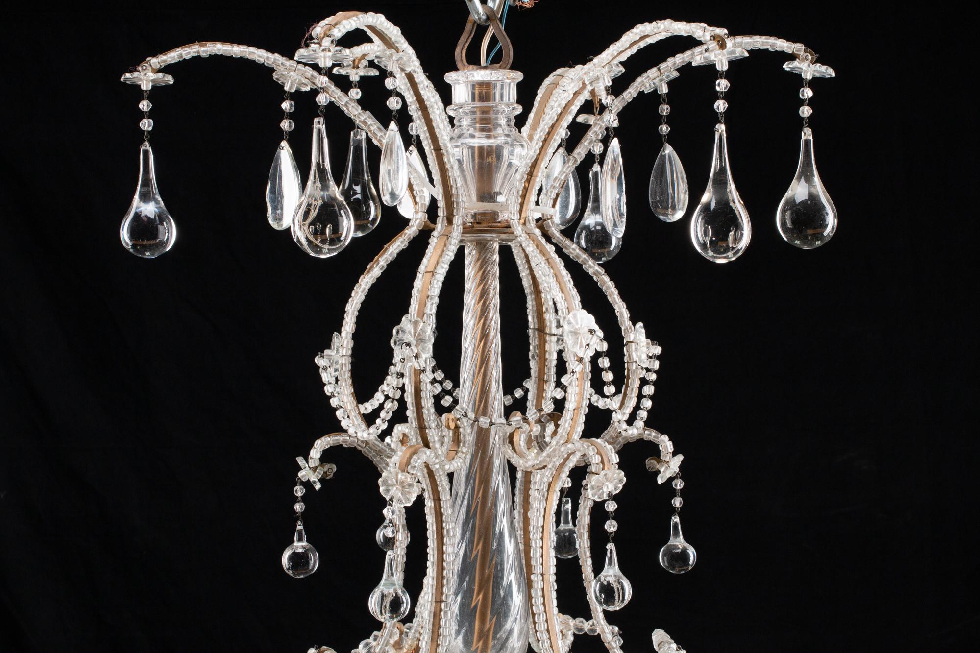 A Louis XV Style Bronze and Cut-Glass Eighteen-Light Chandelier