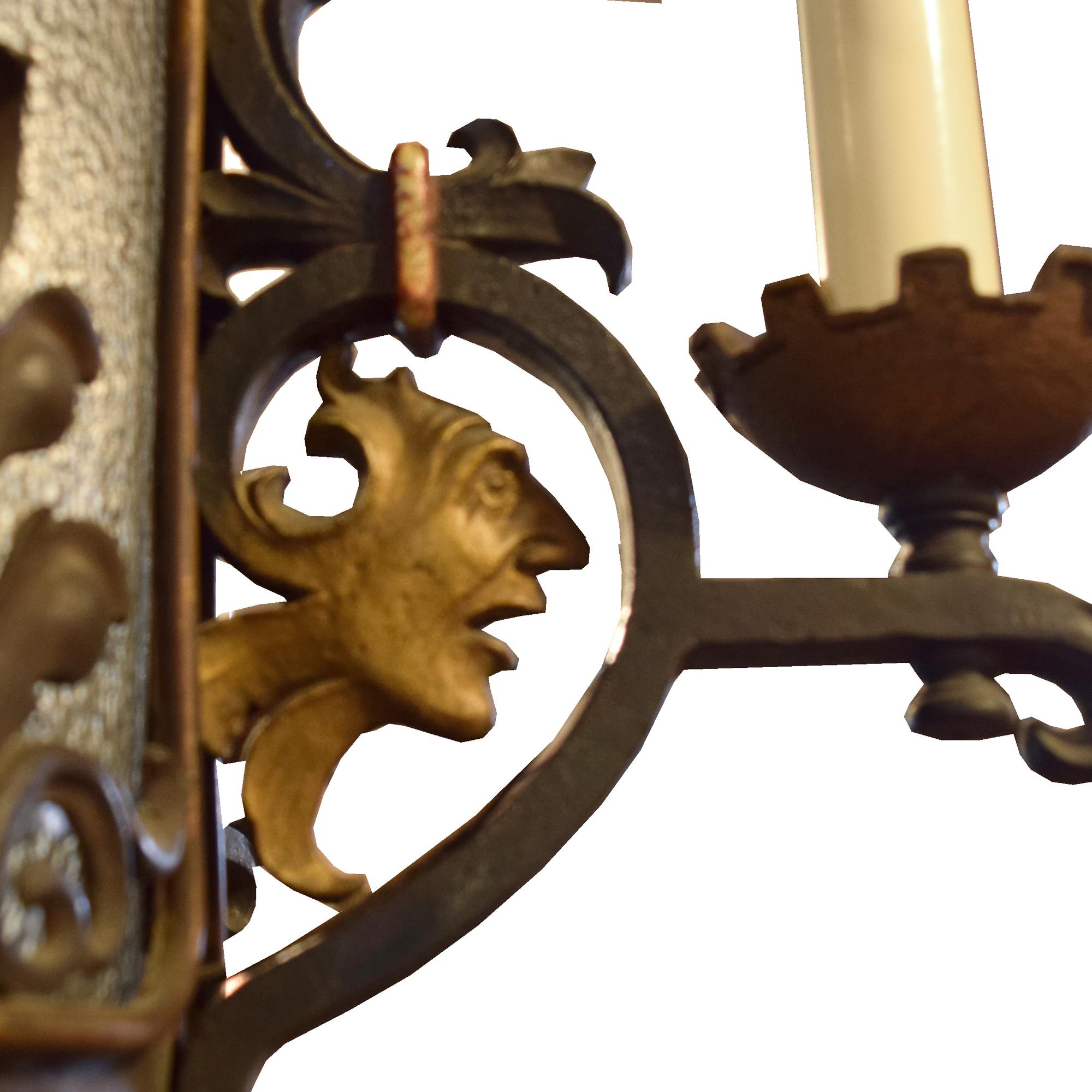 A Bronze and Iron Chandelier from a Chicago Theatre 28" W x 28" D x 75" H — United States, 20th Century
