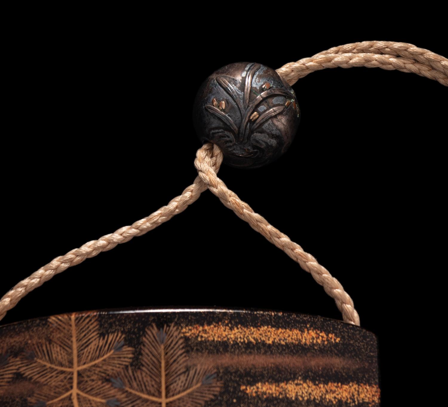 A Japanese Gold and Black Four-Case Inro