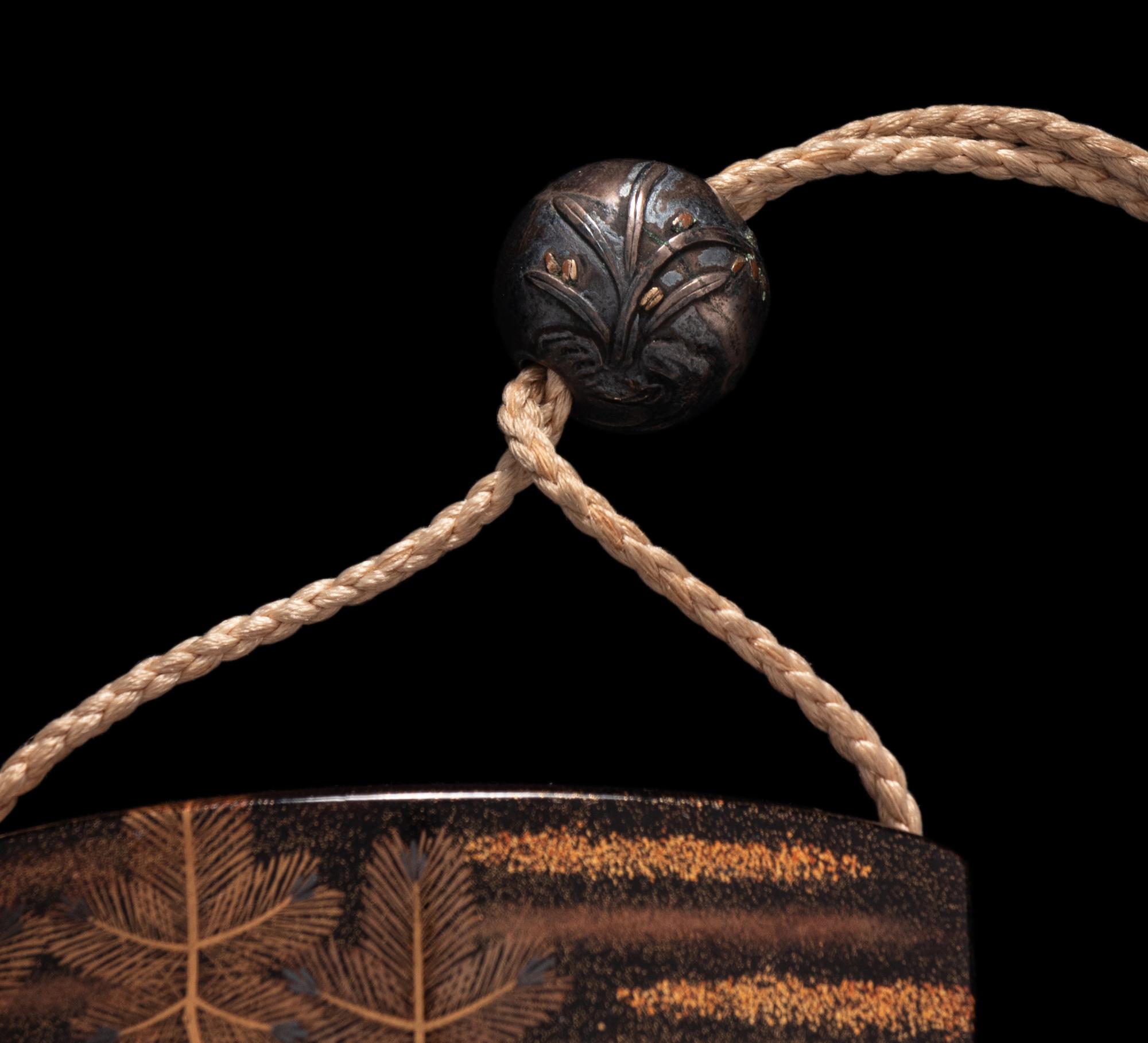 A Japanese Gold and Black Four-Case Inro