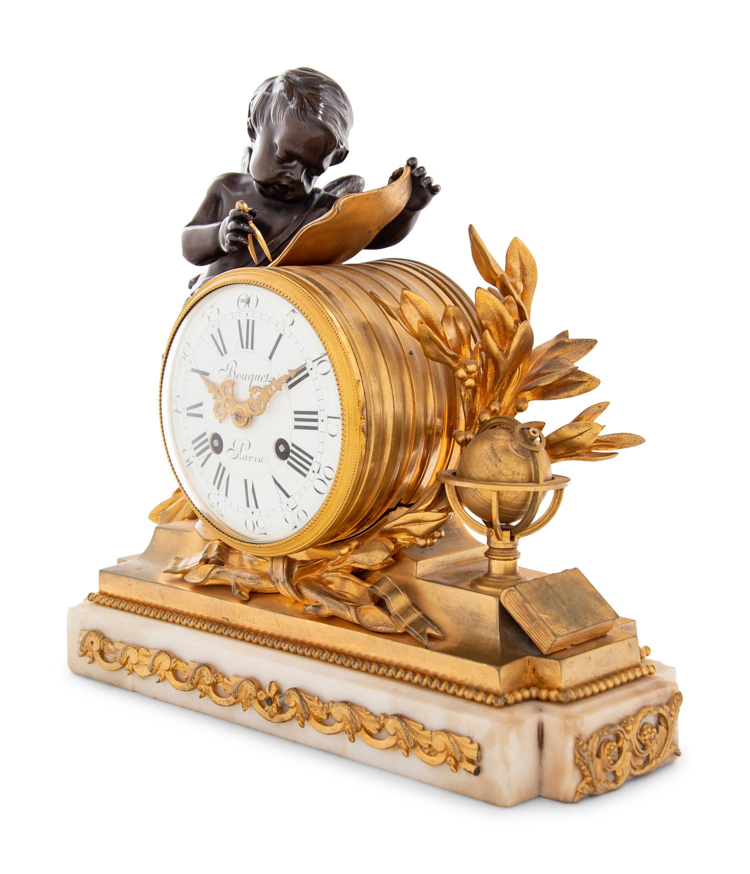 A Louis XVI Style Gilt and Patinated Bronze and Marble Mantel Clock