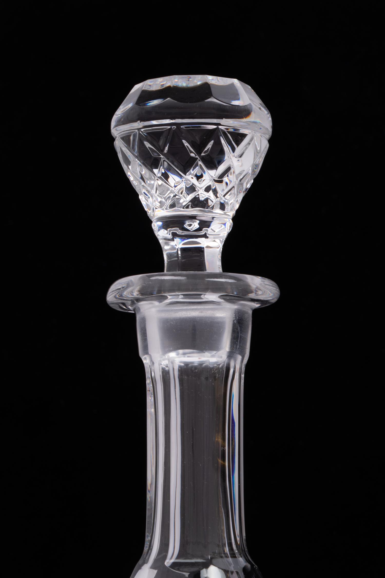 A Group of Three Cut Glass Decanters