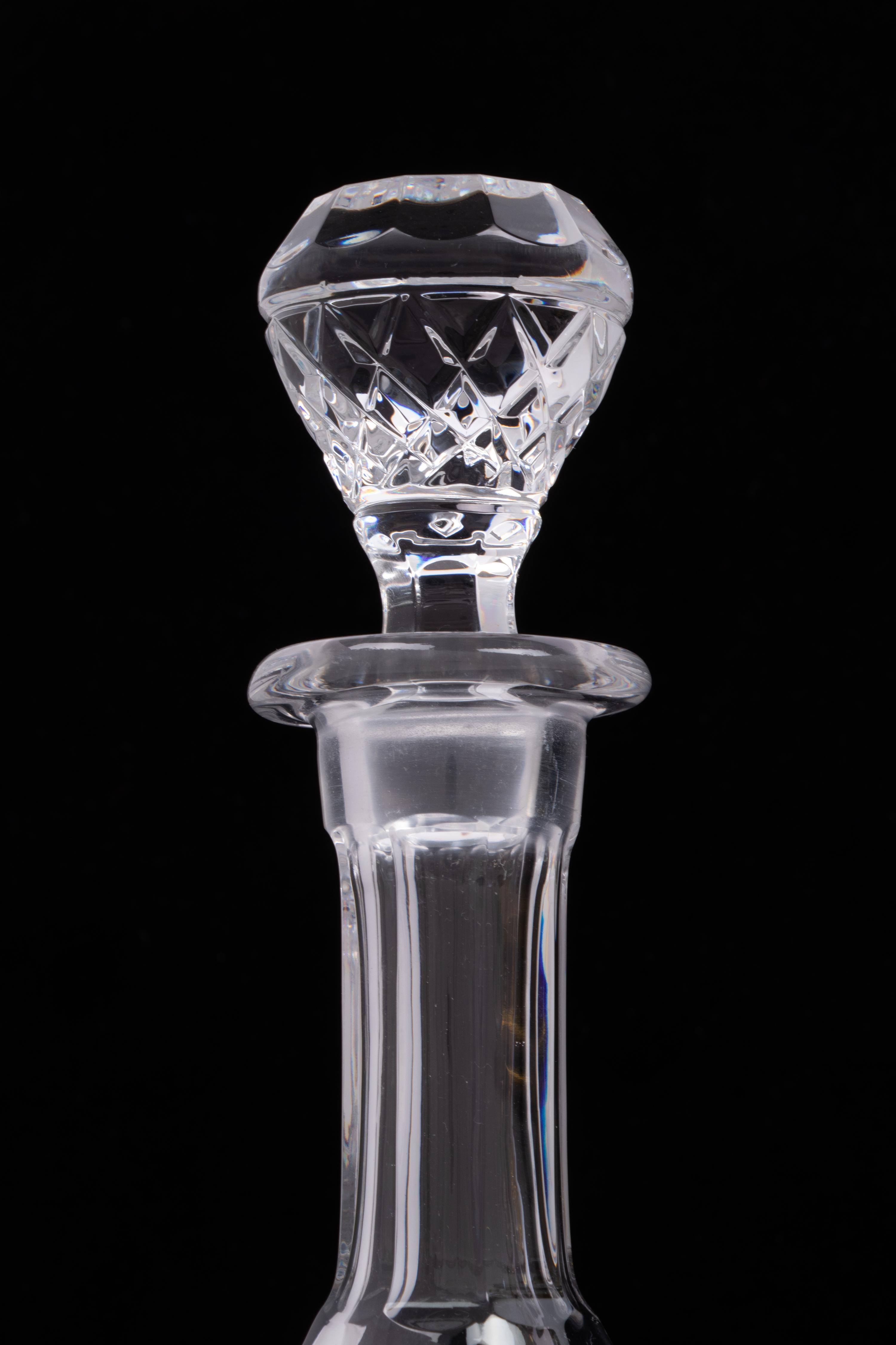 A Group of Three Cut Glass Decanters