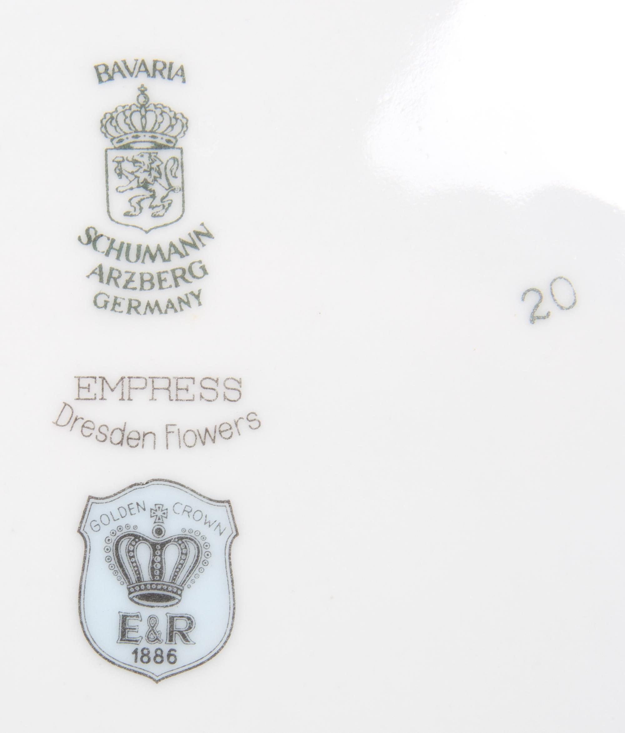 A Bavarian Porcelain Partial Dinner Service for Twelve, Schumann, Width of platter 14 3/8 inches.