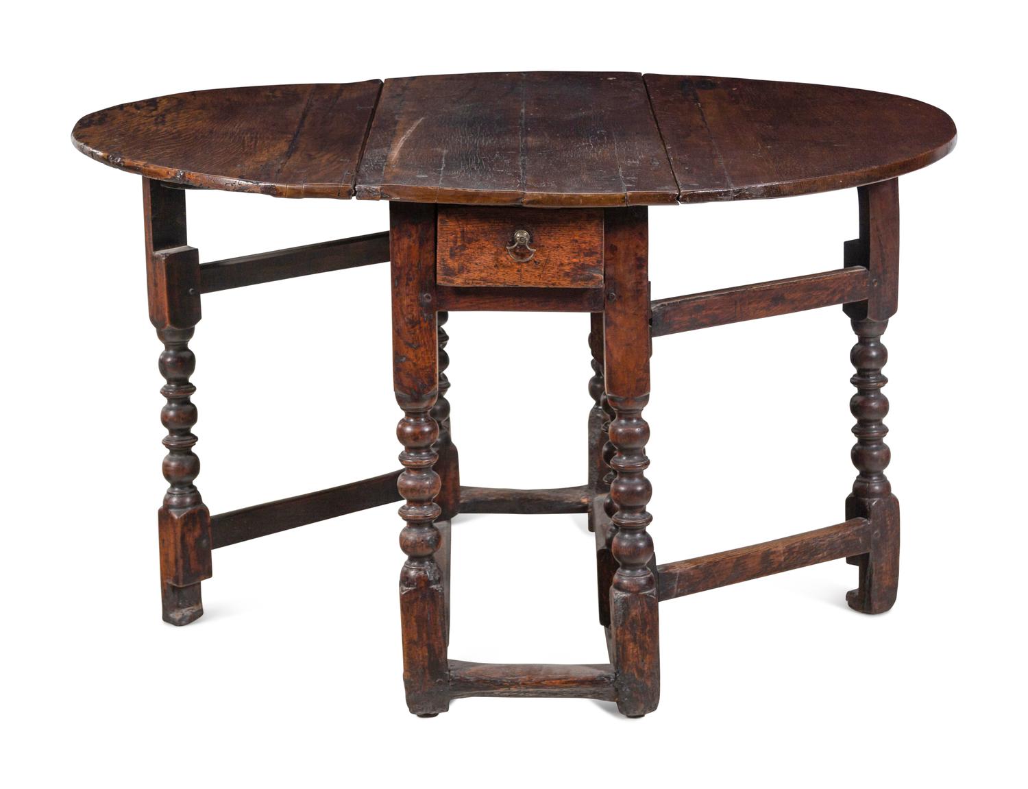 A William and Mary Carved Oak Gate-Leg and Drop-Leaf Table