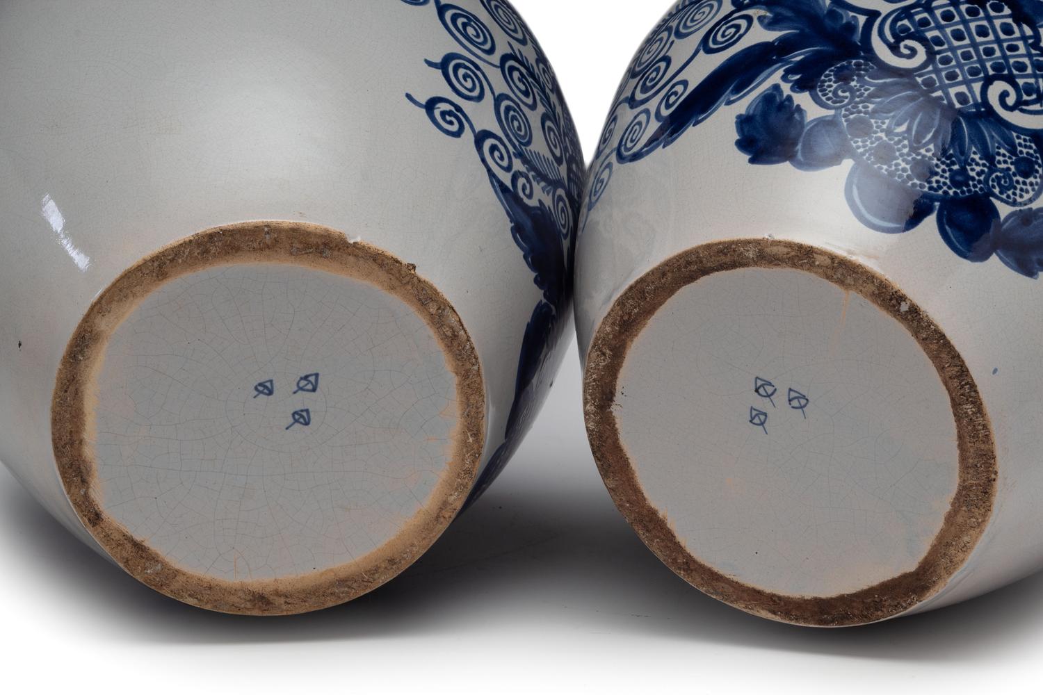 A Pair of Delft Lidded Tobacco Jars