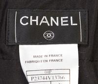 A Chanel Black Boucle Skirt Suit, Size 36.