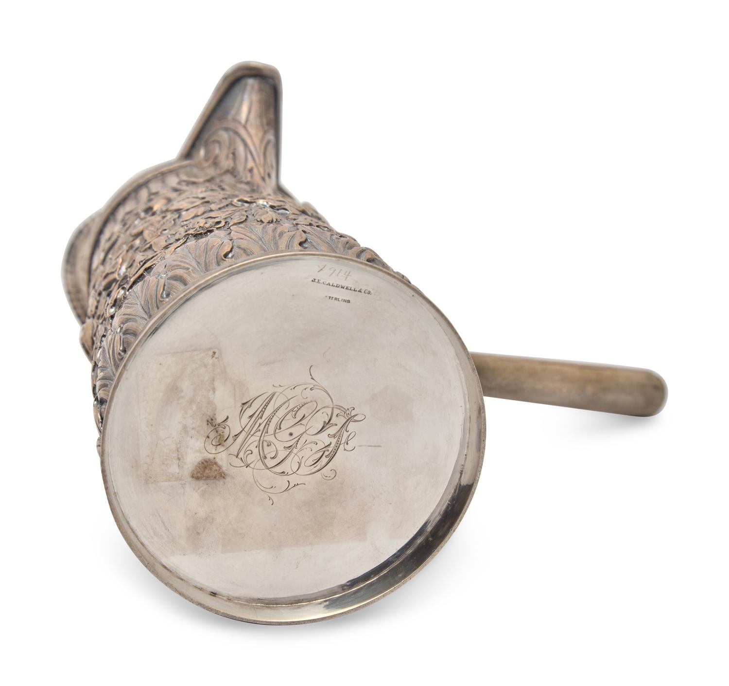 A Sterling Silver Floral Repousse Chocolate Pot, J.E. Caldwell & Co., Philadelphia, PA, Late 19th Century