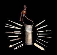 A Rare Japanese Silver Portable Tool Kit and Three Writing Sets