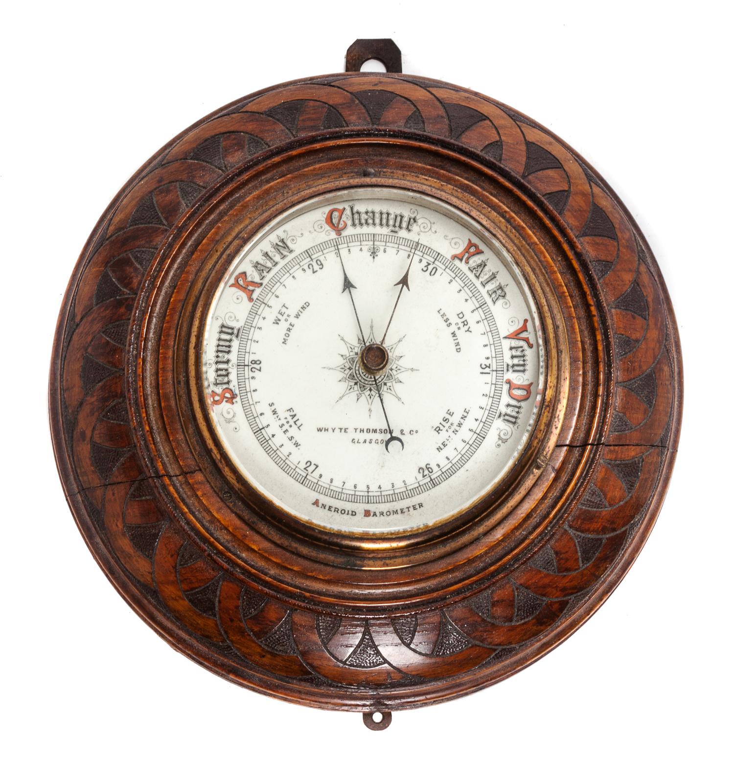 An English Oak Cased Aneoid Barometer Diameter 10 inches. — WHYTE THOMSON & CO.