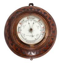 An English Oak Cased Aneoid Barometer Diameter 10 inches. — WHYTE THOMSON & CO.