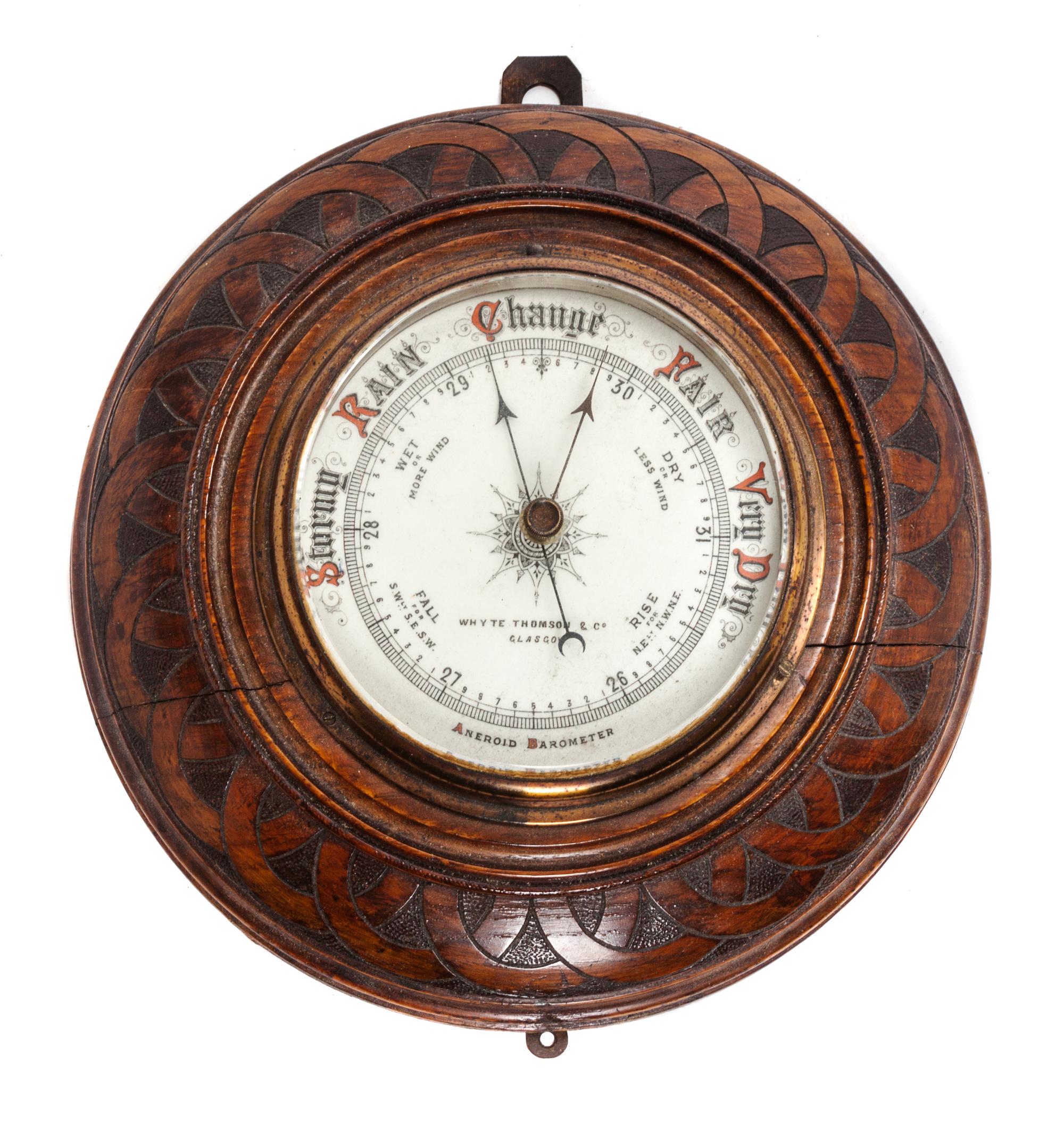 An English Oak Cased Aneoid Barometer Diameter 10 inches. — WHYTE THOMSON & CO.