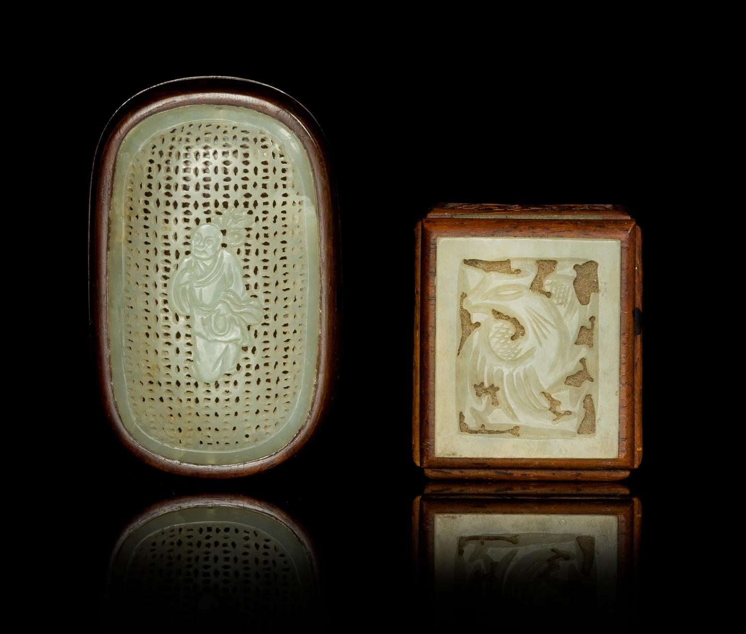 Two Carved Jade Plaques Length of larger 2 1/2 inches.