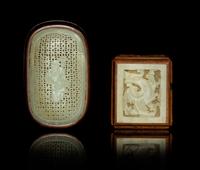Two Carved Jade Plaques Length of larger 2 1/2 inches.