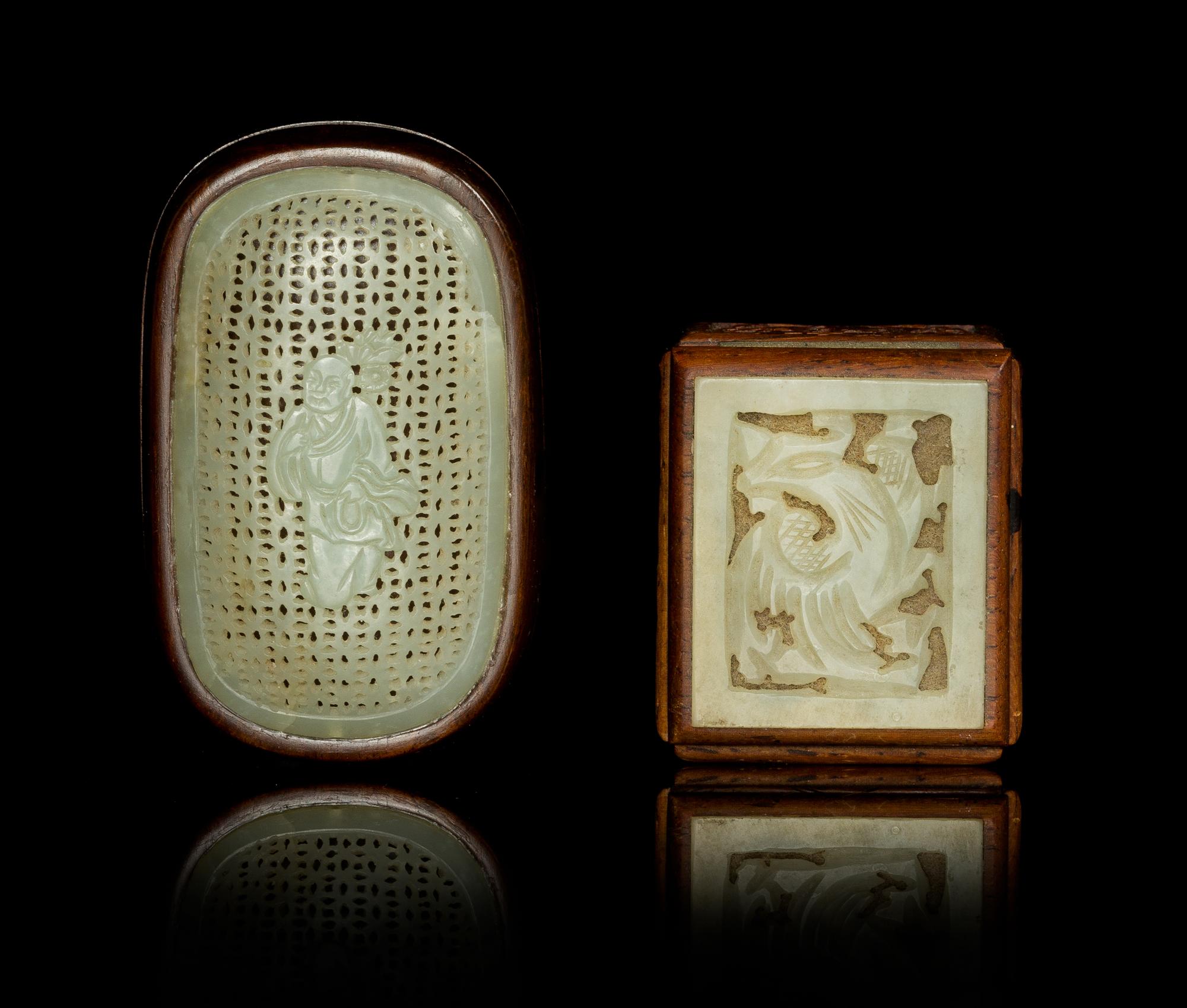 Two Carved Jade Plaques Length of larger 2 1/2 inches.