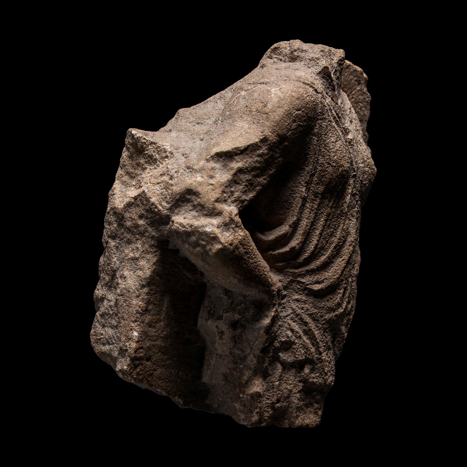 A Tarantine Limestone Relief of a Draped Female