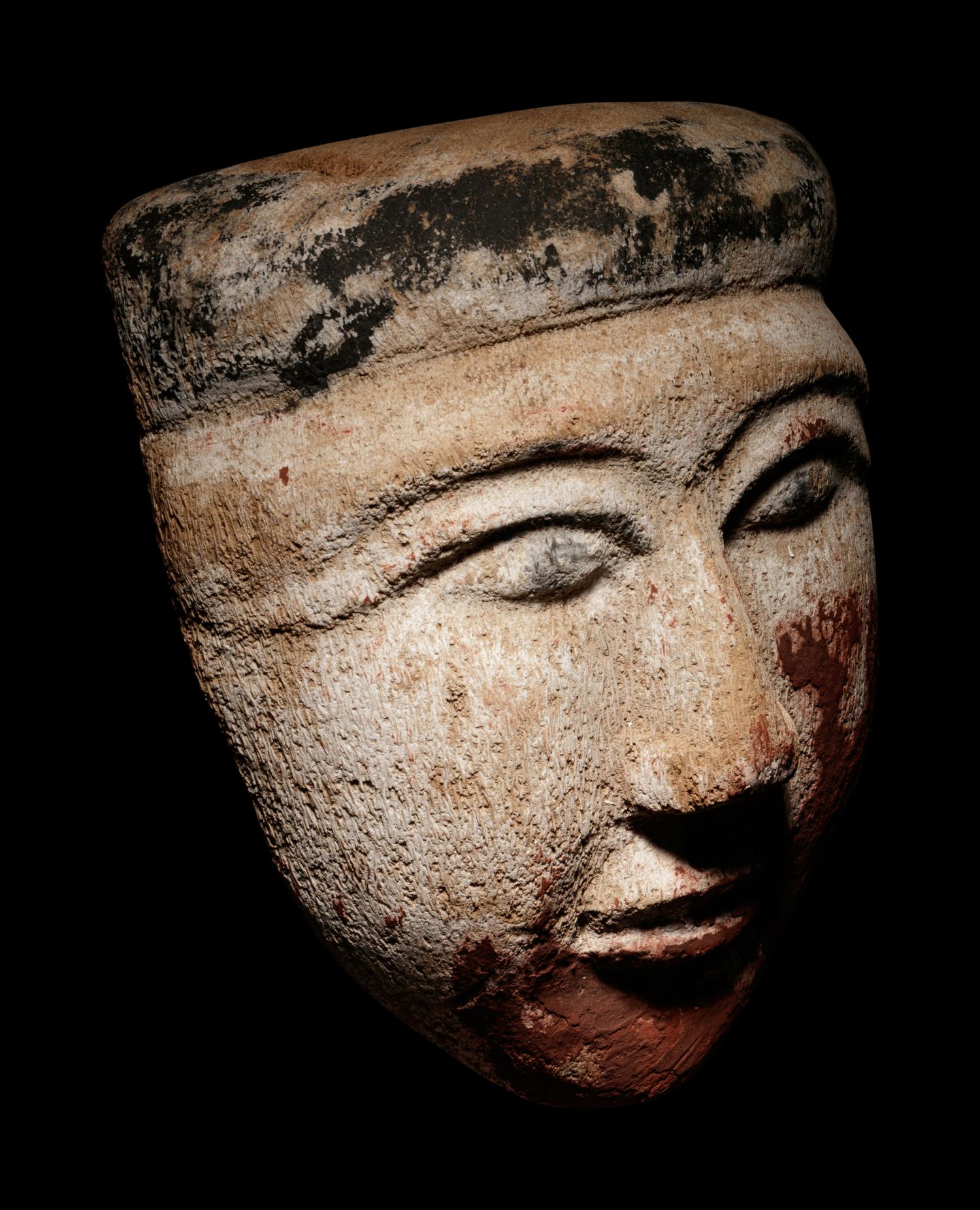 An Egyptian Wood Mummy Mask