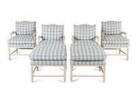 A Set of Four White Painted Patio Chairs and Ottomans