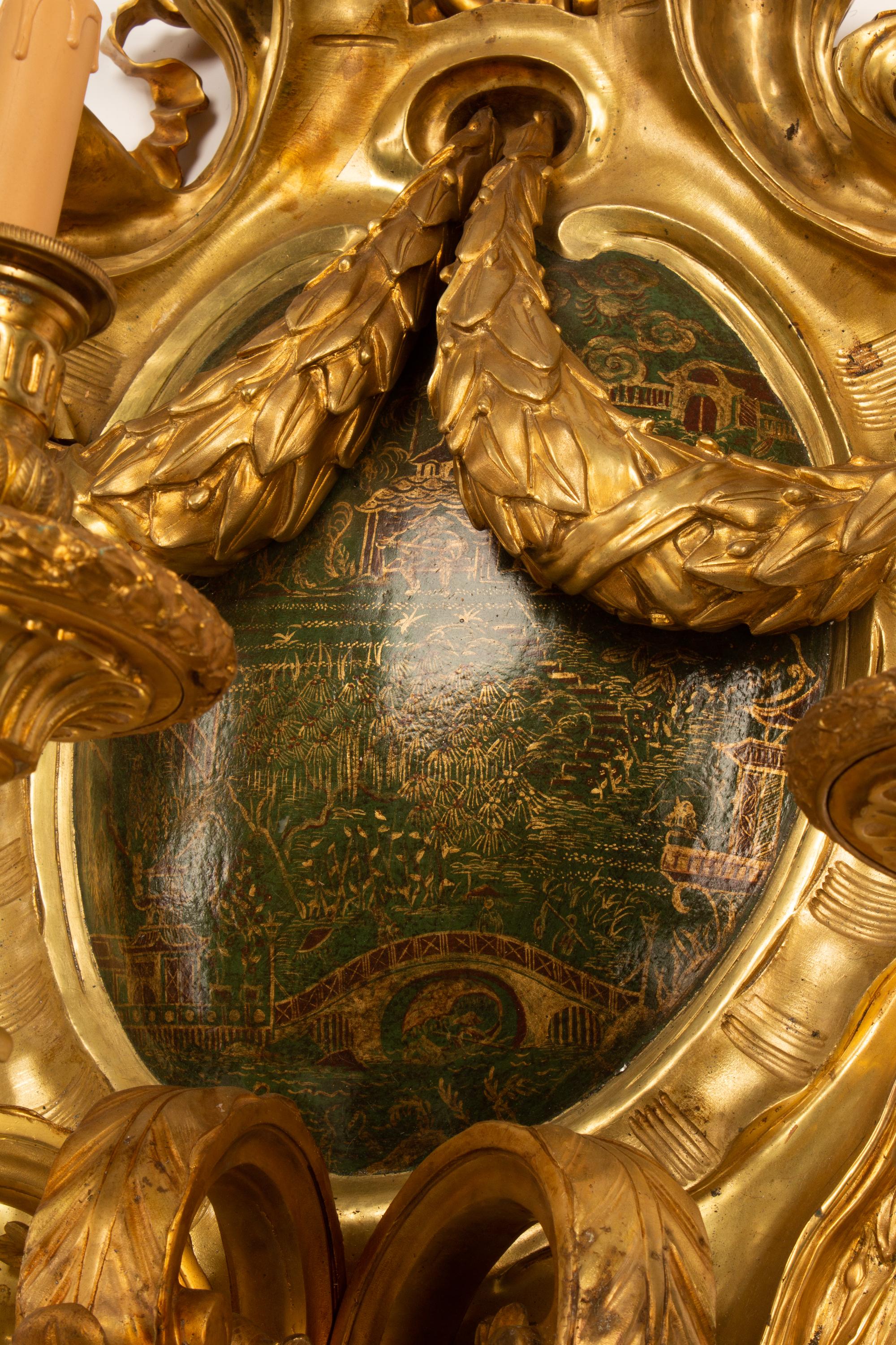 A Pair of Louis XV Style Gilt Bronze Sconces with Chinoiserie Decoration