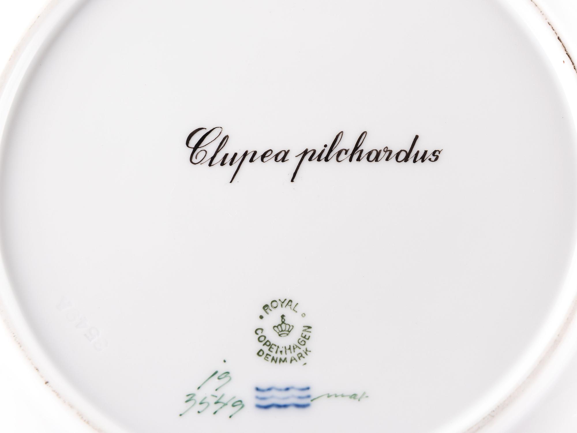 A Set of Twelve Royal Copenhagen Parcel Gilt Porcelain Fish Plates