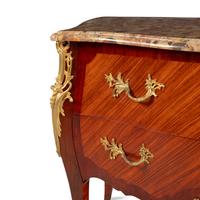 A Louis XV Style Gilt Bronze Mounted Mahogany, Kingwood and Breche d'Alep Marble-Top Commode